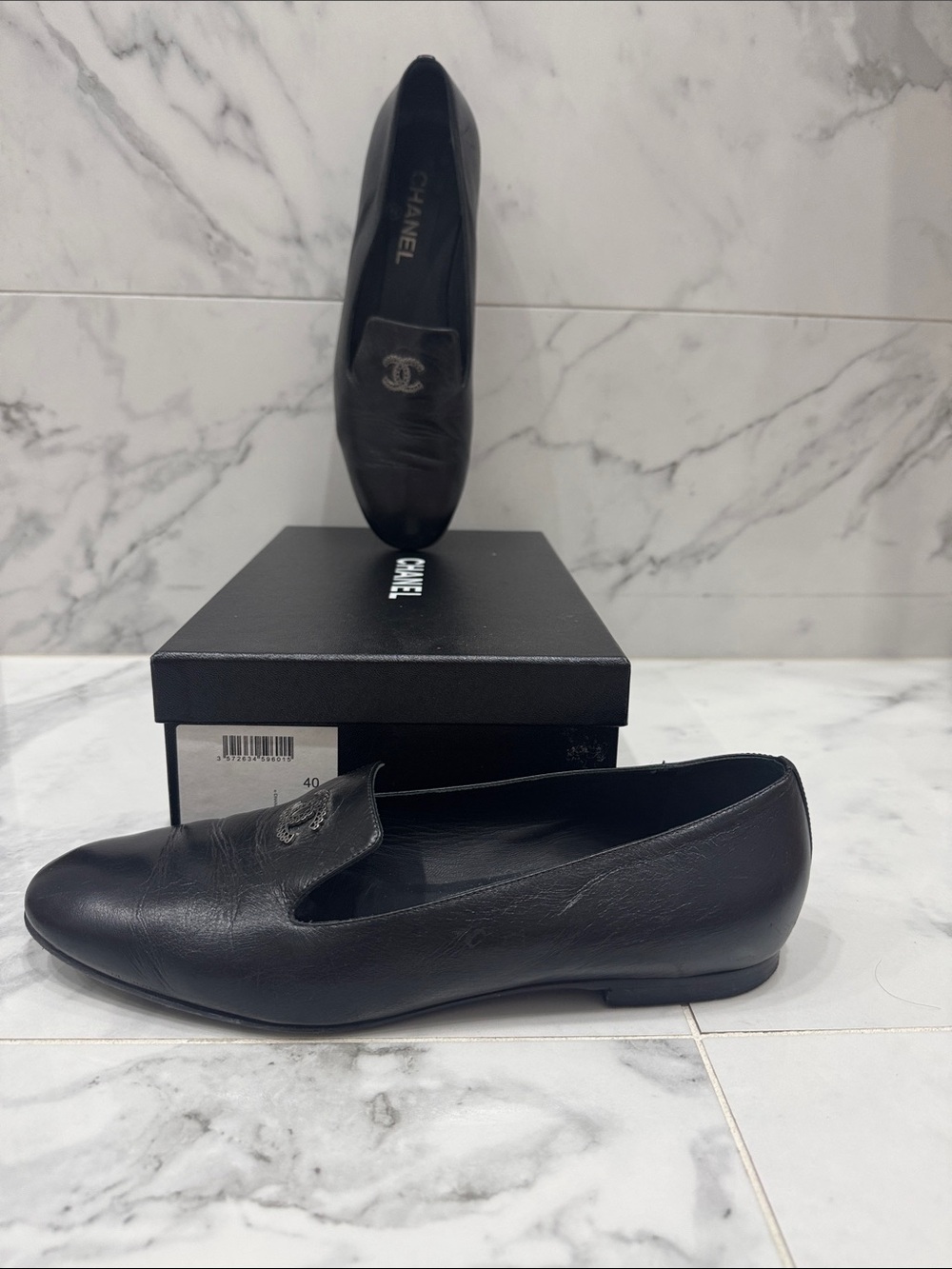 CHANEL Black Leather Slip-On Loafers with CC Emblem
